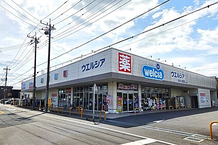 ウエルシア越谷大房店（現地より徒歩8分） 約620m