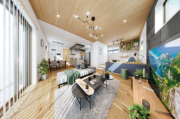 【PLAN03/小上がりラウンジ】段差でゆるやかにつながるリビングと小上がりラウンジは、家族それぞれの時間を尊重しながら、自然と気配が重なり合う住まいの中心。フルフラットキッチンを起点に会話が生まれ、朝はワイド洗面に家族が集います。