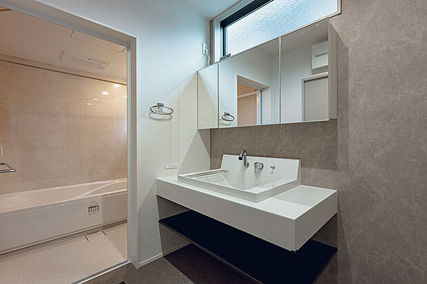 【洗面室(2号棟)】洗面室には追加オプションによりガス衣類乾燥機「乾太くん」を設置可能です。