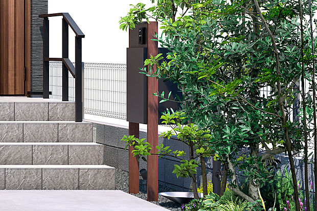 【【宅配ボックス付門柱】】不在時も荷物の受け取りに便利な大容量の宅配ボックスを外構部分に設置しました。スタイリッシュなデザインで、街並みにも調和します。