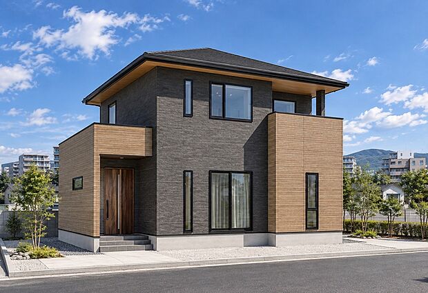 外観写真:ダークグレーと木目調のコントラストが映える2階建て。前面道路に面し、バルコニーや大きな窓が開放感を演出します。落ち着いた色調とシャープなフォルムで街並みに馴染み、
