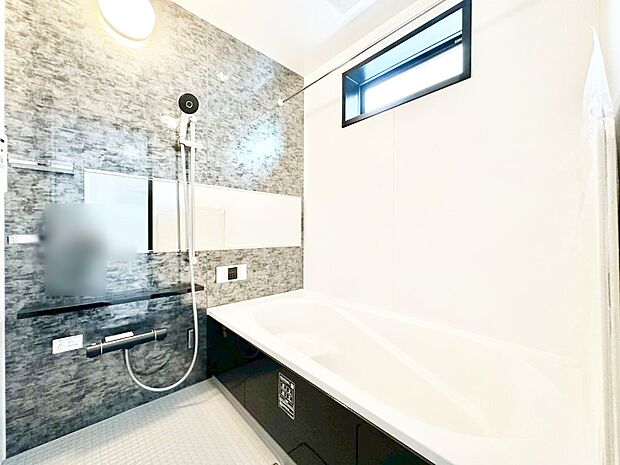 落ち着いた雰囲気でゆっくりお寛ぎいただけるバスルーム