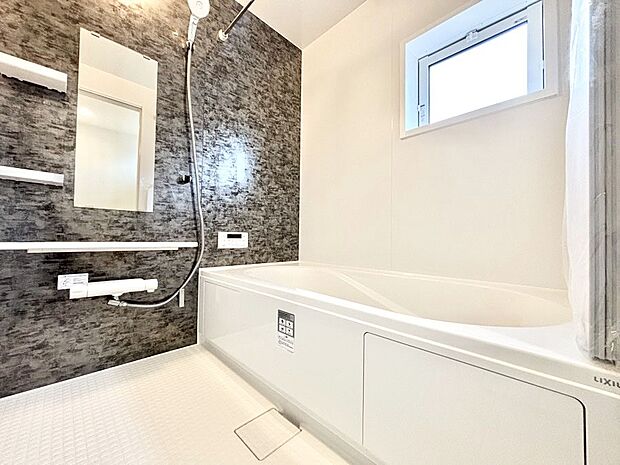 落ち着いた雰囲気でゆっくりお寛ぎいただけるバスルーム