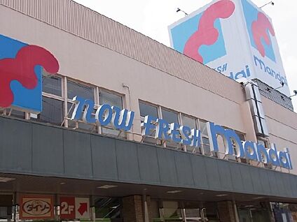 万代寝屋川西店 徒歩560m