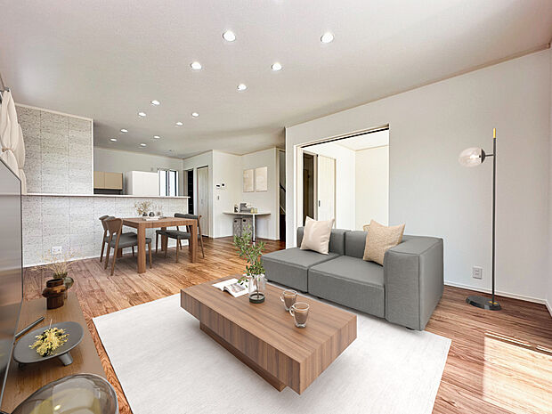 【1号棟：リビング】自然に家族が集まりたくなるような、広くて風通しの良いリビングです！
※写真は合成イメージです。