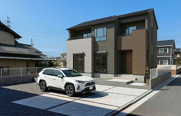 【1号棟 外観完成イメージ】現地写真にパースを合成したものです