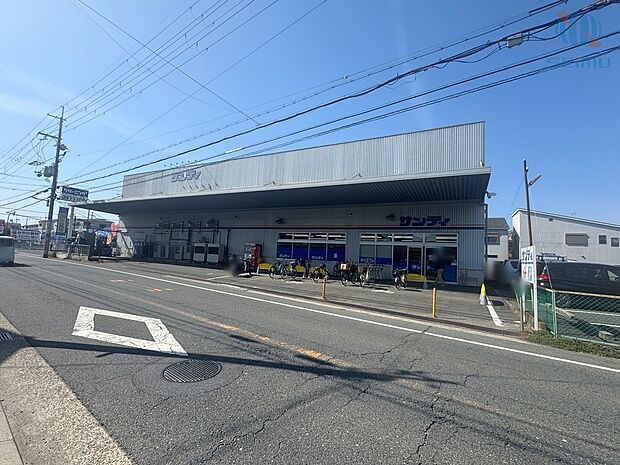 サンディ萱島神田店(約600m)