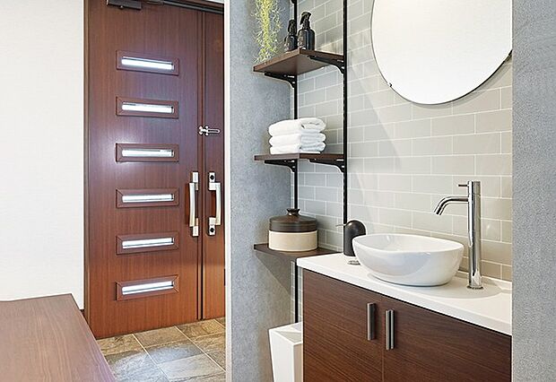 【玄関付近の手洗い】玄関そばに手洗いスペースを設置。手洗いを習慣化してウイルスを室内に持ち込みにくくします。