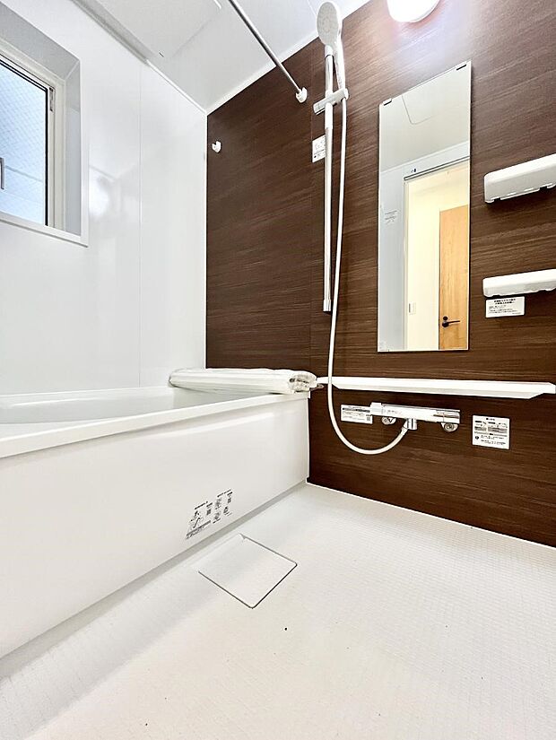 落ち着いた雰囲気でゆっくりお寛ぎいただけるバスルーム