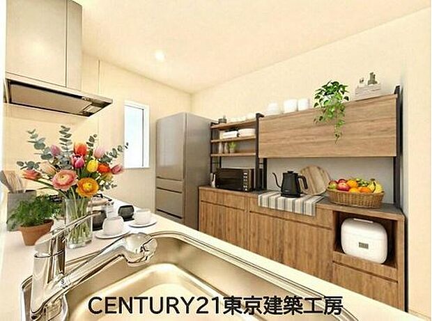 【同仕様：家具はCGにてレイアウト】
キッチンは収納数もさる事ながら、リビングで寛ぐ家族や小さなお子様を見守りながら料理が出来る「対面式の温もり設計」。