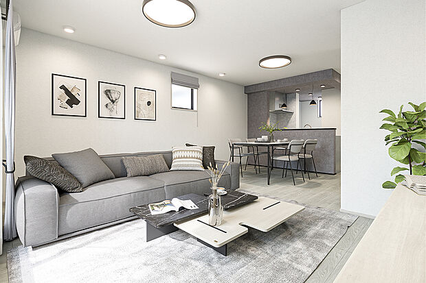 【リビングダイニング完成予想図】T-1/2階リビングを採用した、南向きで明るい18.7帖のLDK。グレイッシュモダンなインテリアが洗練された雰囲気を演出し、たっぷりの陽光に包まれながら、家族が心地よく集える空間です。