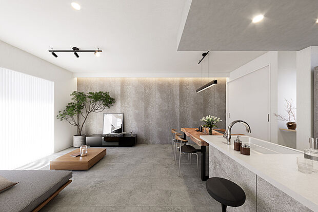 リビングの一角に段差を設けて空間をゾーニングし、掘り机スタイルのカウンターをしつらえました。