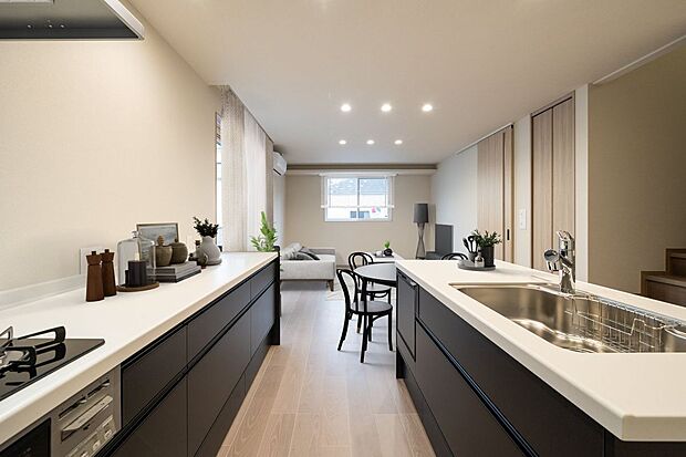 ■4号地リビングキッチンはシックな色合いのデザインを採用しました。白をベースとした室内のアクセントになっています。※CG合成にて家具を設置