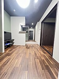 ジーイーオンズ 1階1LDKのリビング/ダイニング