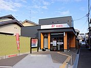 向日町駅前郵便局 725m