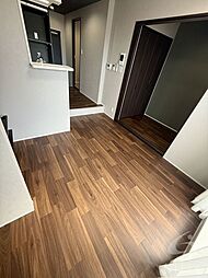 ジーイーオンズ 1階1LDKのリビング/ダイニング