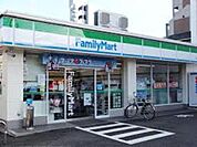 ファミリーマート千里丘北口店 290m