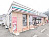 周辺：セブン-イレブン 日野高幡橋南店 (550m)