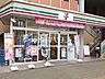 周辺：セブンイレブン 日野高幡不動駅前店 (430m)