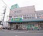 周辺：スーパーイワキ 淀店まで160m 住所は久世郡ですが、最寄は淀駅 町のスーパーです