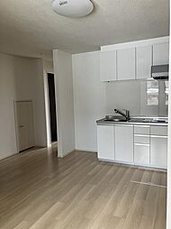 カーサ・コルーテ南 104 1階1LDKのリビング/ダイニング