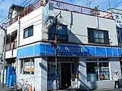 コンビニ「ローソン三鷹台駅前店まで312m」