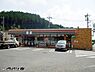 周辺：コンビニ 1200m セブン-イレブン 青梅四小前店(徒歩15分)