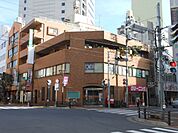 郵便局「駅前郵便局まで180m」