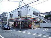 コンビニ「セブンイレブンまで390m」