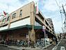 周辺：【スーパー】コモディイイダ 東新町店まで135ｍ