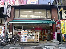 【スーパー】まいばすけっと 王子駅北口店まで597ｍ