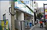 周辺：ファミリーマート阪急伊丹駅前店 173m