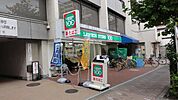 ローソンストア100台東根岸三丁目店 徒歩5分。コンビニ 390m