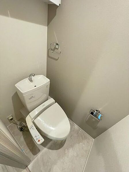 毎日使うトイレは落ち着きと清潔感のあるデザイン