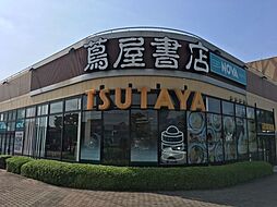 レンタルビデオ「蔦屋書店まで390m」
