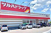 ツルハドラッグ庭坂店　90ｍ/徒歩2分