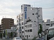 病院「米田病院まで1200m」
