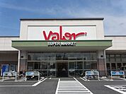 スーパー「バローまで1100m」