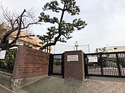 中学校「市立日比津中学校まで390m」