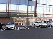 コンビニ「セブンイレブンまで380m」