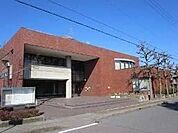 図書館「一宮市立尾西図書館まで390m」