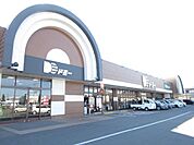 スーパー「ドミー渡津店まで858m」