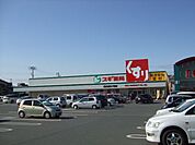 ドラッグストア 「スギ薬局まで870m」