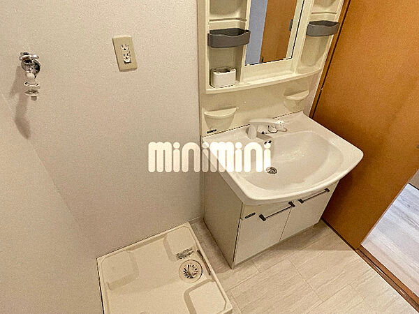 画像6:トイレ（温水洗浄便座にします）