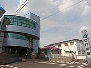 病院「江口医院まで710m」