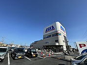 複合モール「尾張旭ショッピングタウンアスカまで909m」