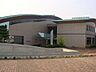 周辺：図書館「蟹江町図書館まで883m」