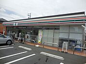 コンビニ「セブンイレブンまで390m」