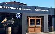 飲食店「Ｅ→Ｆカレーまで850m」