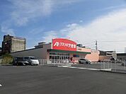 ドラッグストア 「クスリのアオキまで640m」